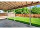 Relaxing backyard featuring a patio, a shed, and lush green grass at 6353 W 78Th Ave, Arvada, CO 80003