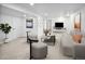 Basement living room featuring modern furniture and decor against bright white walls at 6353 W 78Th Ave, Arvada, CO 80003