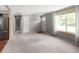 Bright living room with new carpet, neutral paint, and lots of natural light at 6353 W 78Th Ave, Arvada, CO 80003