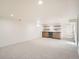 Finished basement featuring a built-in bar area with lots of space for entertaining at 2076 S Yates St, Denver, CO 80219