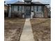 Charming single-Gathering home featuring a well-maintained front yard and inviting entrance at 2619 S Bannock St, Denver, CO 80223