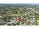 Aerial view of a home in a suburban neighborhood, surrounded by lush trees and greenery at 3485 S Clermont St, Denver, CO 80222