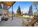 Landscaped backyard features an outdoor patio with lounge seating at 3485 S Clermont St, Denver, CO 80222