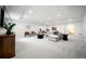 Spacious living room with modern furnishings, recessed lights and plush carpet at 3485 S Clermont St, Denver, CO 80222