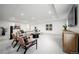 Large living room with recessed lighting, modern furnishings and plush carpet at 3485 S Clermont St, Denver, CO 80222