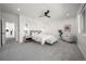 Spacious main bedroom with a ceiling fan, lots of natural light, and neutral decor at 3485 S Clermont St, Denver, CO 80222