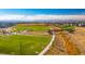 Expansive green space with community features and mountain views at 5439 Verbena St, Denver, CO 80238