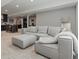 Finished basement with a comfortable seating area, a kitchenette, a dining area, and a work station at 5439 Verbena St, Denver, CO 80238