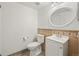 Clean bathroom with updated vanity and tile flooring at 5547 S Lowell Blvd, Littleton, CO 80123