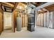 Unfinished basement with exposed ductwork, bare framing and mechanicals at 11213 Vilas St, Parker, CO 80134