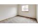 Neutral carpeted bedroom with window providing natural light at 11213 Vilas St, Parker, CO 80134