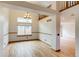 Dining area with hardwood floors and large windows at 11213 Vilas St, Parker, CO 80134