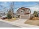 Inviting two-story home with a two-car garage and freshly painted exterior at 11213 Vilas St, Parker, CO 80134