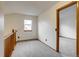 Upstairs hallway featuring neutral carpet, bright paint, and windows for ample natural light at 11213 Vilas St, Parker, CO 80134