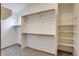 Walk-in closet offering adjustable shelving and ample storage space for organizing clothes at 11213 Vilas St, Parker, CO 80134