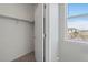 Spacious closet with built-in shelving and window at 14343 E 1St Dr # 202, Aurora, CO 80011