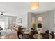 Open concept dining area, with adjacent living room and kitchen, showing a laundry room at 14343 E 1St Dr # 202, Aurora, CO 80011