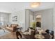 Dining area with a round table and four chairs, near living room at 14343 E 1St Dr # 202, Aurora, CO 80011