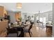 Dining area with a round table and four chairs, adjacent to kitchen at 14343 E 1St Dr # 202, Aurora, CO 80011