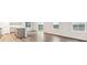 Kitchen open to living room, sliding glass doors at 18998 E 94Th Pl, Commerce City, CO 80022