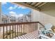 Inviting balcony featuring two chairs and views of the neighborhood at 1885 S Quebec Way # C15, Denver, CO 80231