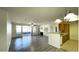 Beautiful living room features a fireplace, ceiling fan, hardwood floors, and lots of natural light at 14333 E 1St Dr # 108, Aurora, CO 80011