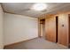 Finished basement bedroom with carpeting and a closet provides a cozy space at 180 Dover St, Lakewood, CO 80226