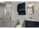 Modern bathroom featuring a shower, sleek vanity, and stylish fixtures at 180 Dover St, Lakewood, CO 80226