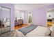 This bedroom features two windows, a desk and ensuite bathroom at 1605 17Th St, Boulder, CO 80302