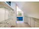 Walk-in closet leads to the bathroom at 1605 17Th St, Boulder, CO 80302