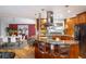 Gourmet kitchen with modern appliances, stylish island seating, and an adjacent dining area at 1605 17Th St, Boulder, CO 80302