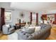 Bright living room with stylish gray furniture, hardwood floors, and ample natural light at 1605 17Th St, Boulder, CO 80302