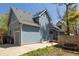 View of the back of the house showing the siding, garage, and outdoor space at 1605 17Th St, Boulder, CO 80302
