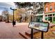 Charming town square with benches, trees, and local shops and restaurants in the background at 1605 17Th St, Boulder, CO 80302