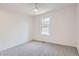 Bright bedroom featuring neutral walls, carpet, and a window providing natural light at 10001 E Evans Ave # 74C, Aurora, CO 80247