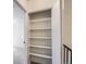 Convenient hallway closet with shelving for storage and organization solutions at 10001 E Evans Ave # 74C, Aurora, CO 80247