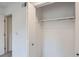 A spacious, well-lit bedroom closet with a hanging rod for clothes organization at 10001 E Evans Ave # 74C, Aurora, CO 80247