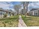 Charming community featuring well-maintained lawns and inviting walkways in a quiet neighborhood setting at 10001 E Evans Ave # 74C, Aurora, CO 80247