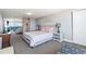 Bright bedroom featuring carpet, mirrored closet, and a minimalist aesthetic at 1155 N Ash St # 1408, Denver, CO 80220