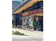 Dine at Culinary Dropout and see a large mural while walking in the surrounding shopping area at 1155 N Ash St # 1408, Denver, CO 80220
