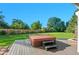 Backyard deck with hot tub, offering a serene and private outdoor experience at 8000 S Williams Way, Centennial, CO 80122