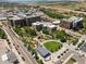 Aerial view of community buildings, green spaces, and surrounding streets showcases the neighborhood at 20 Wilcox St # 309, Castle Rock, CO 80104