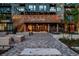 Beautiful building entrance, featuring paved walkway, landscaping, and lighting at 20 Wilcox St # 309, Castle Rock, CO 80104