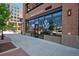 Commercial building exterior, Block & Bottle, with signage and outdoor seating visible from the sidewalk at 20 Wilcox St # 309, Castle Rock, CO 80104