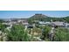Scenic neighborhood view featuring lush trees and views of the mountains in the distance at 20 Wilcox St # 309, Castle Rock, CO 80104