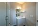 Modern bathroom with glass-enclosed shower, stylish vanity, and elegant finishes at 1355 Zenobia St, Denver, CO 80204