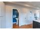 Stylish half-bathroom with a pedestal sink and bold blue accent wall at 1355 Zenobia St, Denver, CO 80204