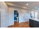 Stylish half-bathroom with a pedestal sink and bold blue accent wall at 1355 Zenobia St, Denver, CO 80204