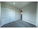 Neutral bedroom featuring plush carpet and a closet at 1355 Zenobia St, Denver, CO 80204