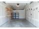 Spacious garage with ample storage space and functional shelving at 1355 Zenobia St, Denver, CO 80204